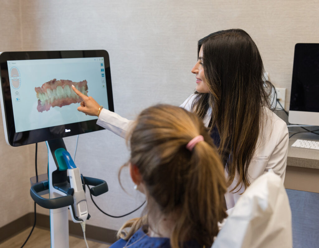 dr michelle perez showing teeth projection